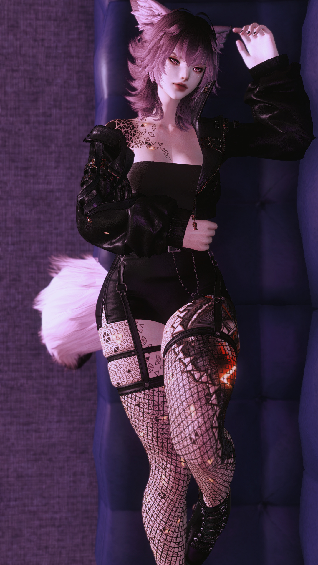 Onyx, Reclined. An image of a pink-haired woman, fluffy vulpine ears on display, laying back on a couch. She stares up at the camera with sharp, vulpine eyes.